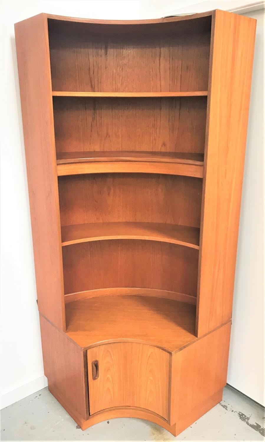 G PLAN ILLUMINATED CURVED TEAK CORNER UNIT with a plain top above three curved shelves, the base