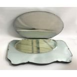 OVAL WALL MIRROR with a bevelled plate, 61cm wide, together with a shaped oblong wall mirror with