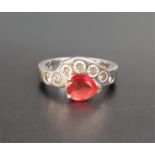 FIRE OPAL AND DIAMOND DRESS RING the pear cut fire opal with a row of diamonds running from side