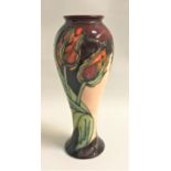 MOORCROFT RED TULIP VASE of waisted form, 27cm high