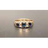 SAPPHIRE AND DIAMOND RING the graduated oval cut sapphires separated by small diamonds, on nine