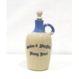 GORDON & MACPHAIL MORAY BRAND DECANTER An empty earthenware decanter from 1970's in Blue and Cream