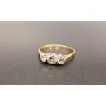 GRADUATED DIAMOND THREE STONE RING the round brilliant cut diamonds totaling approximately 0.