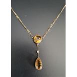 EDWARDIAN CITRINE AND SEED PEARL NECKLACE the pendant section with a round cut citrine above a