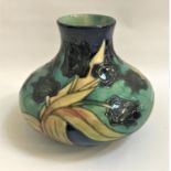 MOORCROFT BLACK TULIP VASE of squat form, 20.5cm high