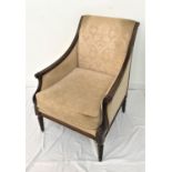 MAHOGANY FRAME ARMCHAIR with a padded back, sides and seat with a loose seat cushion, standing on