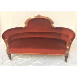 EDWARDIAN WALNUT AND INLAID PARLOUR SOFA with a shaped padded back and arms above a stuffover