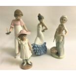 FOUR NAO FIGURINES comprising a girl with a chamber stick, 26cm high, Flamenco dancer, 24cm high,