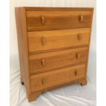 LIGHT OAK CHEST OF DRAWERS with a moulded top above four drawers with D shaped handles, standing