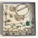 GOOD SELECTION OF SILVER JEWELLERY including silver pendants on chains; a CZ set bangle; two pairs