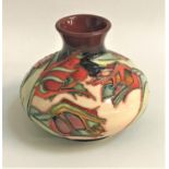 MOORCROFT RED TULIP VASE of squat form, 11cm high