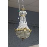 A CONTINENTAL GILT BRASS AND CUT GLASS BASKET CHANDELIER,