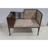 A 19TH CENTURY MAHOGANY INLAID AND UPHOLSTERED SETTEE the shaped top rail with pierced vertical