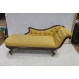 A 19TH CENTURY MAHOGANY AND UPHOLSTERED CHAISE LONGUE the shaped back with buttoned upholstered