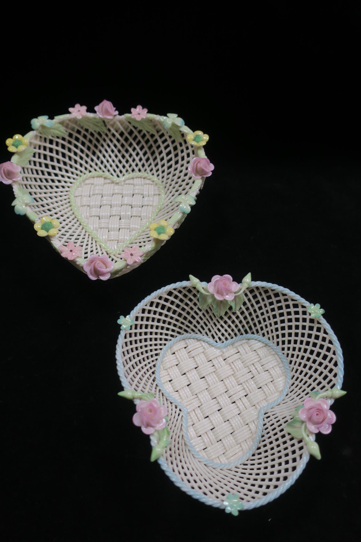 TWO BELLEEK INTERWOVEN HEART SHAPED DISHES with flower encrusted rim