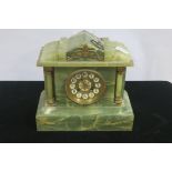 A 19TH CENTURY GREEN ONYX MANTLE CLOCK the rectangular case between cylindrical columns with