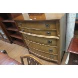 A CANADIAN TEAK TALLBOY of demi lune outline the shaped top above five long drawers on splayed