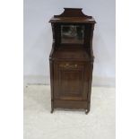 A 19TH CENTURY MAHOGANY INLAID FUEL BIN the superstructure with moulded shelf and mirrored panel