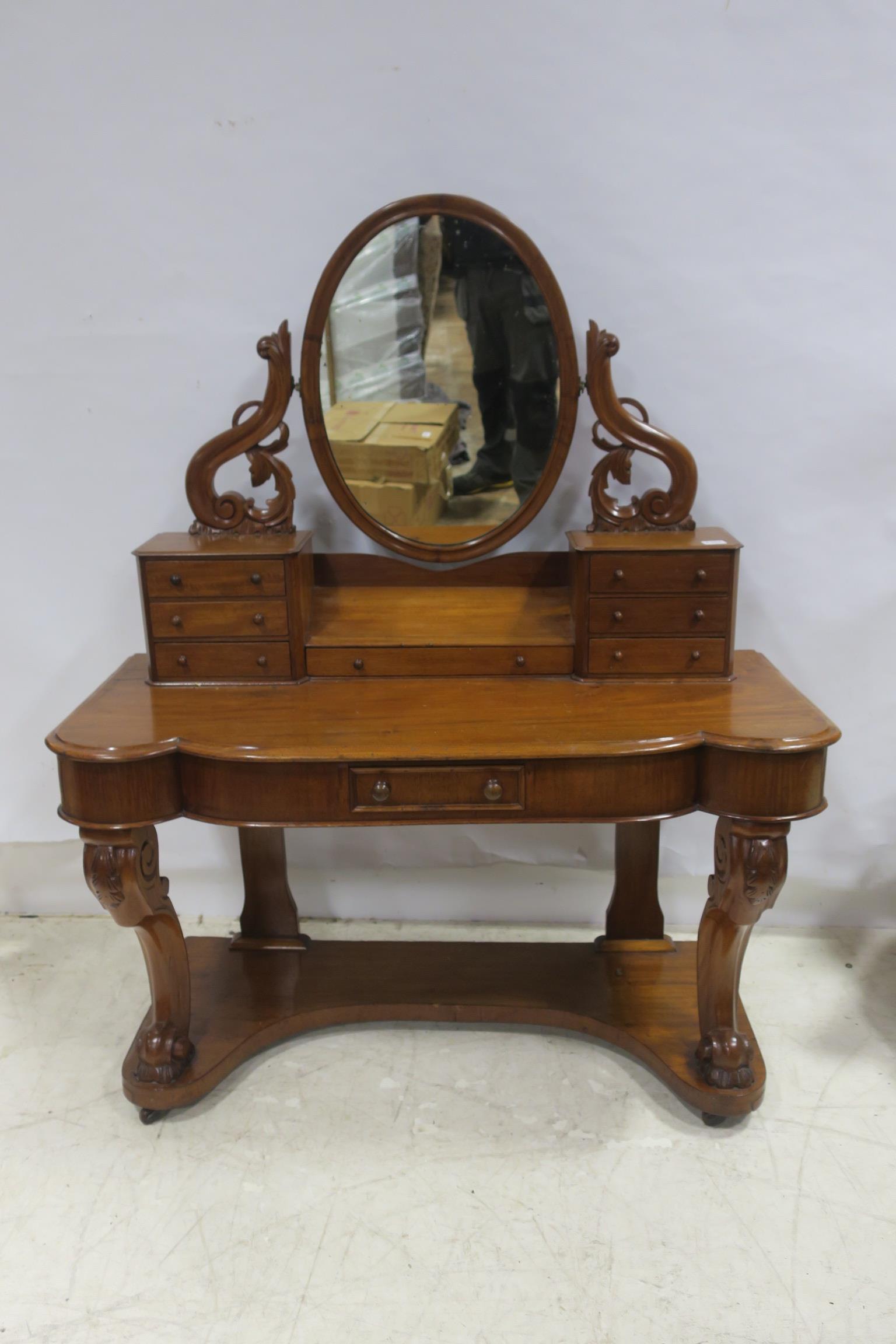 A 19TH CENTURY MAHOGANY DUCHESS DRESSING TABLE the superstructure with oval glass mirror flanked by