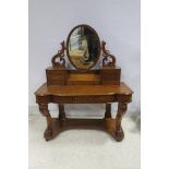 A 19TH CENTURY MAHOGANY DUCHESS DRESSING TABLE the superstructure with oval glass mirror flanked by