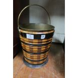 A FRUITWOOD EBONISED AND BRASS SWING HANDLE BUCKET with brass liner 32cm (h) x 28cm (d)