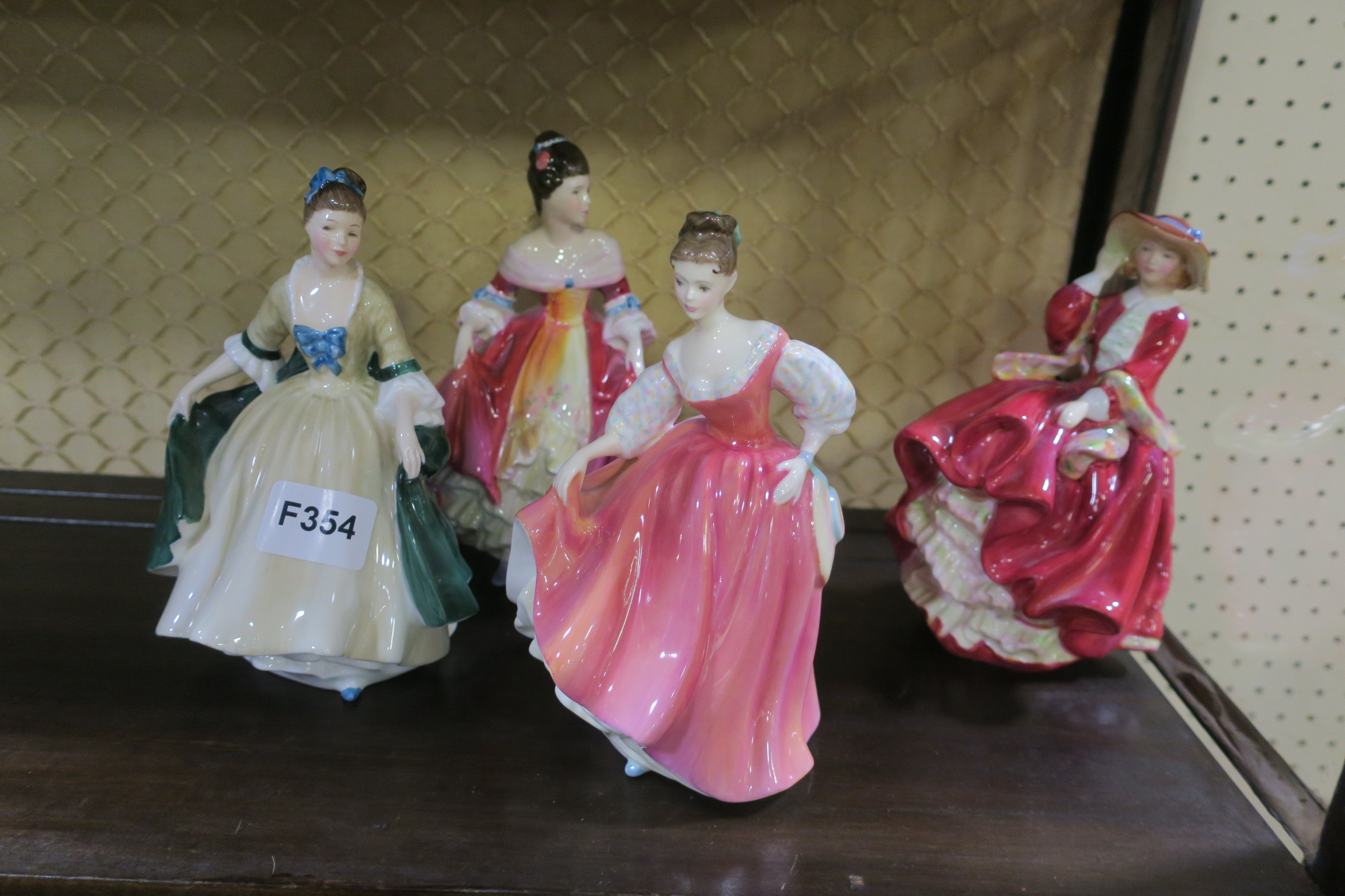 FOUR ROYAL DOULTON BONE CHINA FIGURES modelled as elegance fair lady (coral pink) southern belle