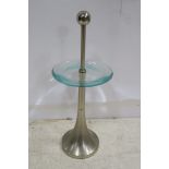 A CHROME AND GLAZED WINE TABLE the circular dish above a spreading column 74cm (h) x 28cm (d)