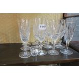 TWELVE WATERFORD CUT GLASS CHAMPAGNE FLUTES