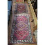 FOUR ORIENTAL WOOL RUGS