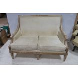 A CONTINENTAL POLYCHROME AND UPHOLSTERED TWO SEATER SETTEE with loose cushions on square tapering