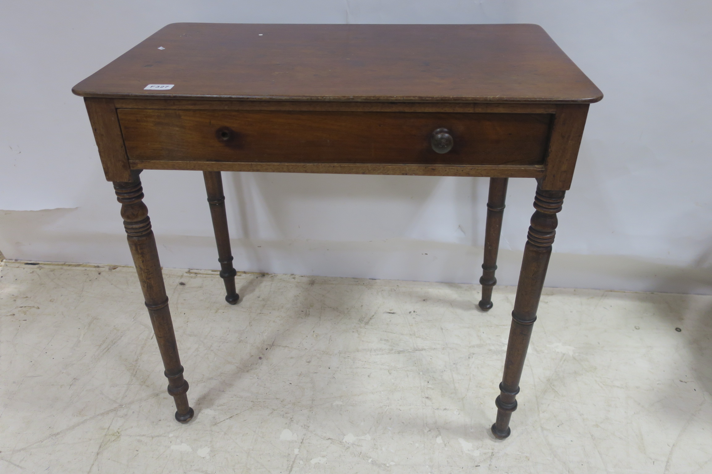 A 19TH CENTURY MAHOGANY OCCASIONAL TABLE of rectangular outline with frieze drawer on turned legs