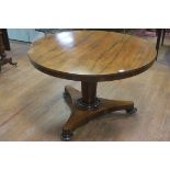 A FINE 19TH CENTURY ROSEWOOD POD TABLE the circular top above a cylindrical column on shaped