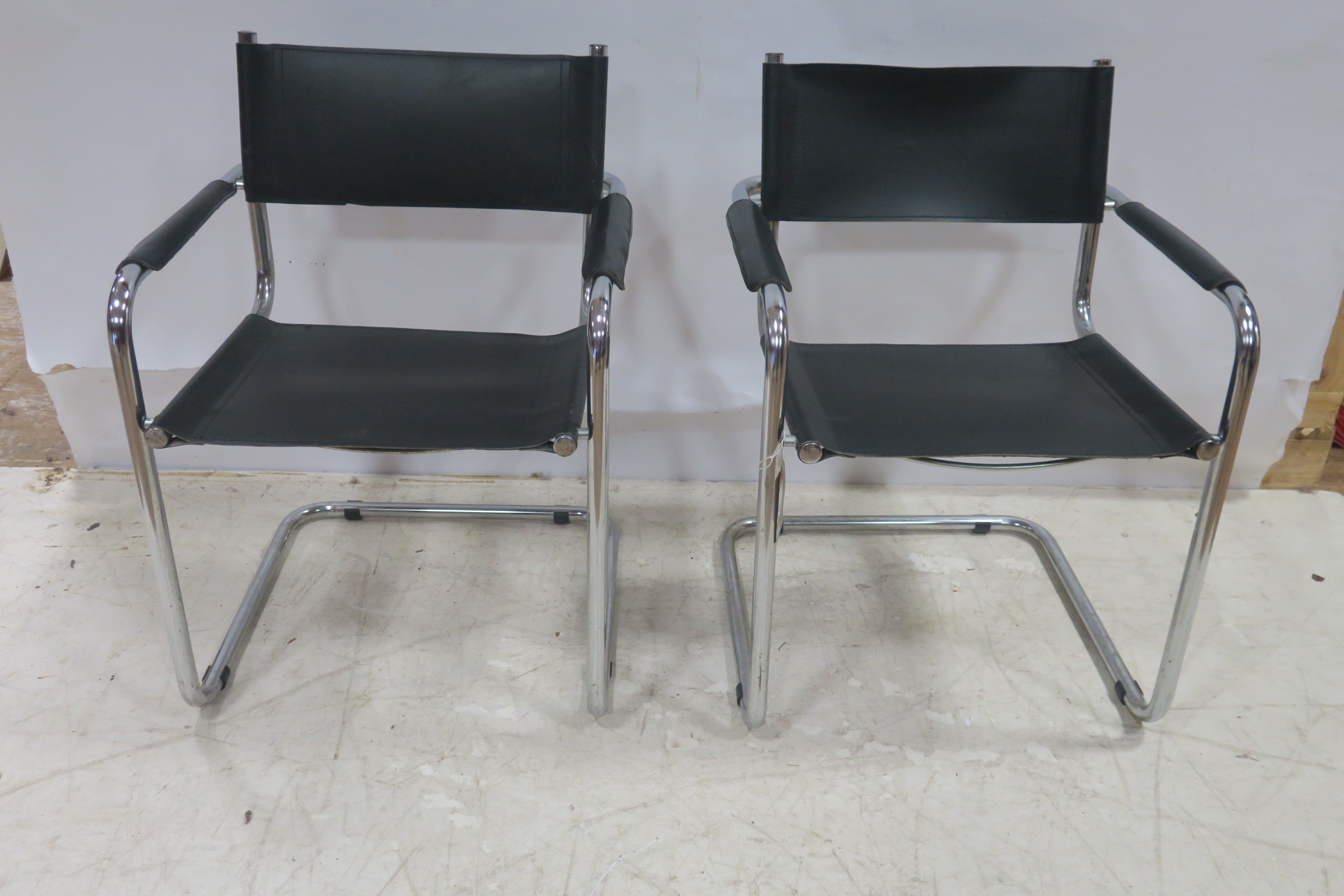 A PAIR OF MART-STAM 5-3-4 VINTAGE CHAIRS each with a chrome frame and hide splat and seat THE