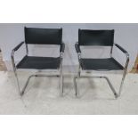 A PAIR OF MART-STAM 5-3-4 VINTAGE CHAIRS each with a chrome frame and hide splat and seat THE