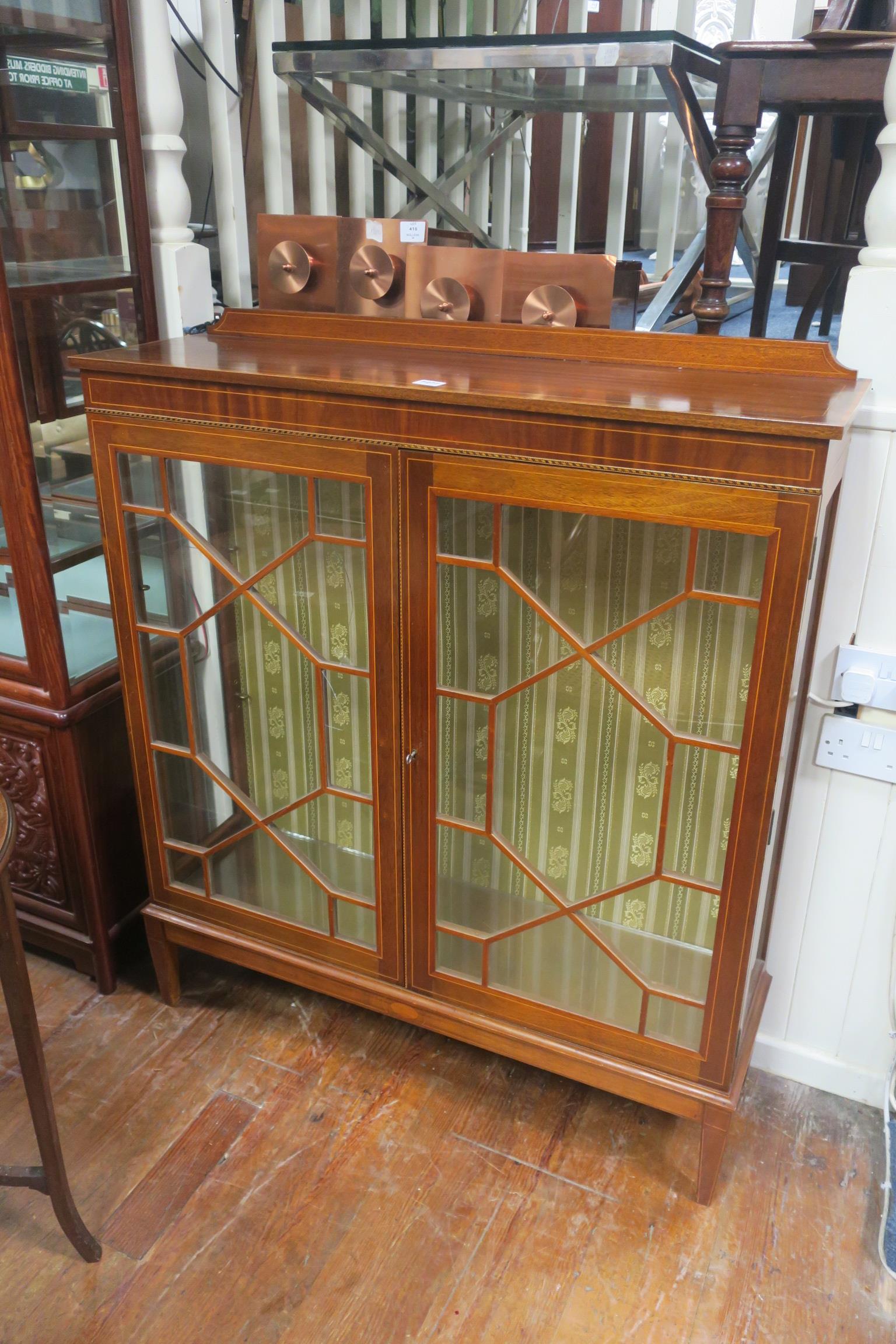 A SHERATON DESIGN MAHOGANY AND SATINWOOD INLAID CHINA DISPLAY CABINET the rectangular top above a