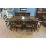 AN EIGHT PIECE HEPPLEWHITE DESIGN MAHOGANY DINING SUITE comprising six chairs including a pair of