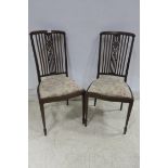 A GOOD PAIR OF 19TH CENTURY MAHOGANY AND SATINWOOD INLAID SALON CHAIRS each with a curved top rail