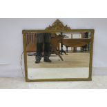 A CONTINENTAL GILT FRAMED MIRROR the rectangular plate within a foliate moulded frame with shell