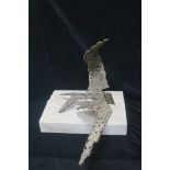 A BRONZE SCULPTURE Bird in Flight On a cut granite stone base 23cm (w)