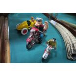 A CAST IRON MODEL OF A CLASSIC RACING CAR together with two cast iron models of motorbikes (3)