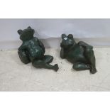 TWO CAST IRON FIGURES each modelled as a frog shown reclining