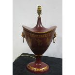 A METAL AND POLYCHROME URN SHAPE TABLE LAMP raised on a circular spreading foot 48cm (h)