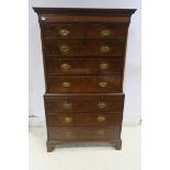 A FINE GEORGIAN MAHOGANY CHEST ON CHEST the dentil moulded cornice above a cross banded frieze