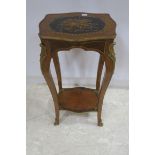 THE CONTINENTAL WALNUT MARQUETRY AND GILT BRASS MOUNTED STAND of serpentine outline the shaped top