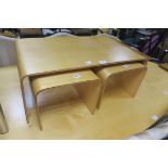 A CONTEMPORARY NEST OF THREE TABLES The larger 36cm (h) x 87cm (w) x 50cm (d)
