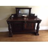 A 19th CENTURY CARVED OAK SIDE TABLE,