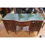 A GOOD 19TH CENTURY MAHOGANY AND SATINWOOD INLAID WRITING DESK of rectangular bowed outline the