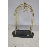 A GOOD BRASS AND CAST IRON STICK STAND the rectangular arch uprights joined by cylindrical