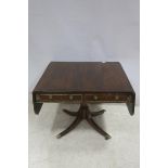 A REGENCY ROSEWOOD AND BRASS INLAID SOFA TABLE the rectangular hinged top with two frieze drawers