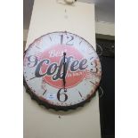A METAL AND POLYCHROME CLOCK in the form of a bottle cap inscribed best coffee in town 50cm (d)